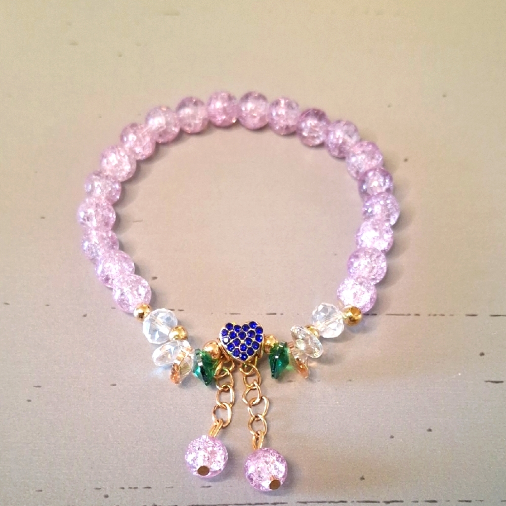 Elegant Pink Beaded Bracelet with Gold Accents & Heart Charm